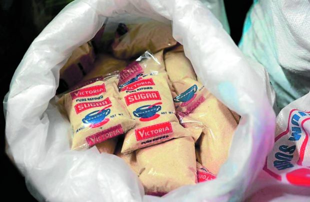 Stock photo of sugar packages. STORY: Sugar import plan not yet finalized – DA