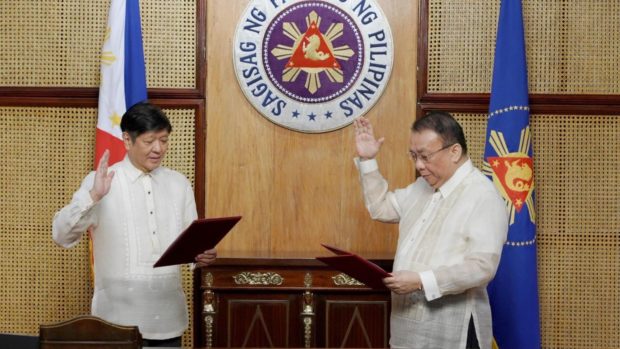 Newly-appointed Executive Secretary Lucan Bersamin during his oath taking before Pres. Ferdinand "Bongbong" Marcos Jr. Photo from Office of the President