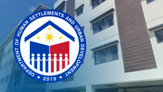 Department of Human Settlements and Urban Development logo over facade of a building. STORY: Government finds 16,000 hectares for socialized housing