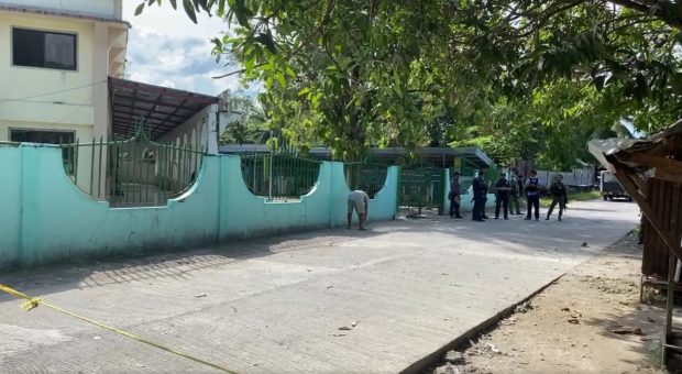Police cordoned off the site where Datu Jamael “Datu Jam” Q. Sinsuat was shot dead as he was leaving a mosque. (Photos from Radyo Bandera Cotabato)