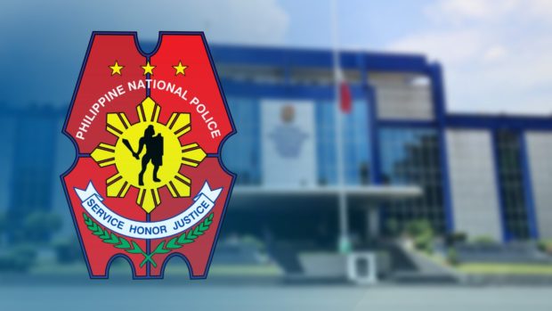 PNP logo over Camp Crame headquarters. STORY: Lawmakers push probe of police media visits