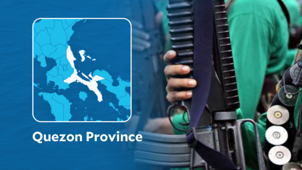 A suspected NPA member surrenders to the police in Quezon province.