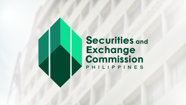 Securities and Exchange Commission logo over dimmed SEC building. STORY: SEC files charges vs unauthorized online lending firms