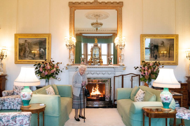 FILE PHOTO: Britain's Queen Elizabeth waits in the Drawing Room before receiving Liz Truss for an audience, where she invited the newly elected leader of the Conservative party to become Prime Minister and form a new government, at Balmoral Castle, Scotland, Britain September 6, 2022. Jane Barlow/Pool via REUTERS