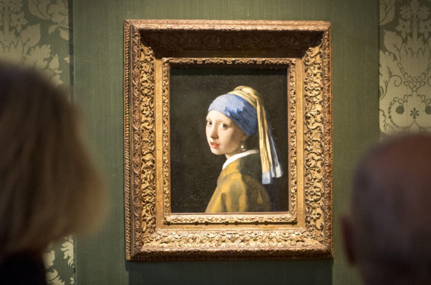 Johannes Vermeer's "Girl with a Pearl Earring" at a Dutch museum was undamaged even after being a target by climate activists.