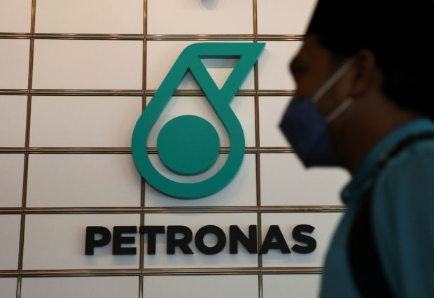 A logo of Petronas is seen at their office in Kuala Lumpur, Malaysia, April 27, 2022. REUTERS/Hasnoor Hussain