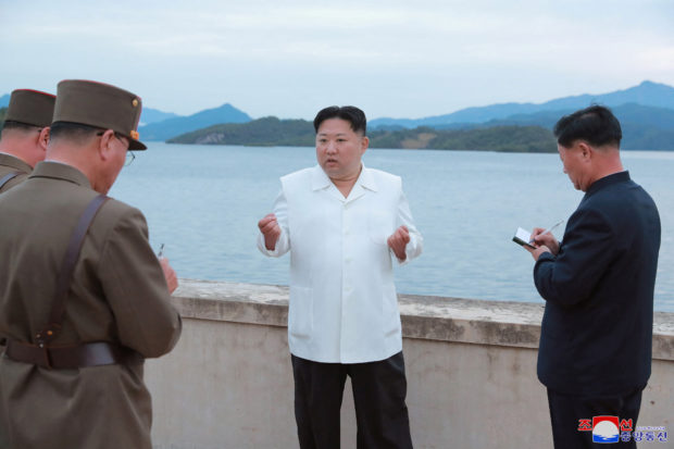 North Korea's leader Kim Jong Un speaks at an undisclosed location in North Korea, in this photo released on October 9, 2022 by North Korea's Korean Central News Agency (KCNA).  KCNA via REUTERS