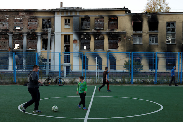 Playground in front of school destroyed by Russian military strike, in Kharkiv. STORY: Ukraine has tenfold increase in poverty due to war – World Bank