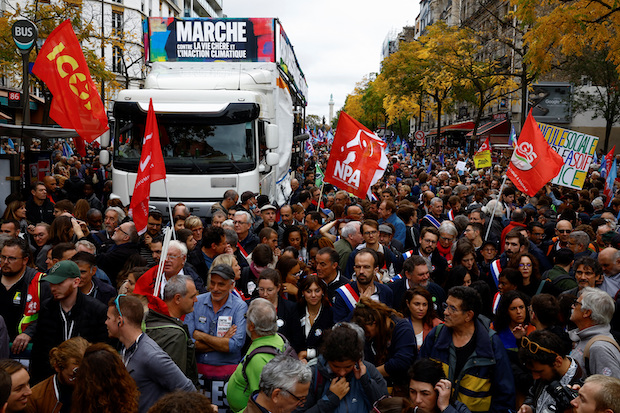 Left-wing alliances stage protest on inflation and climate, in Paris. STORY: Thousands take to streets of Paris to protest soaring prices