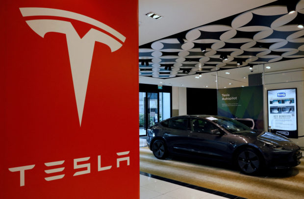 A Tesla model 3 car is seen in their showroom in Singapore October 22, 2021. REUTERS/Edgar Su