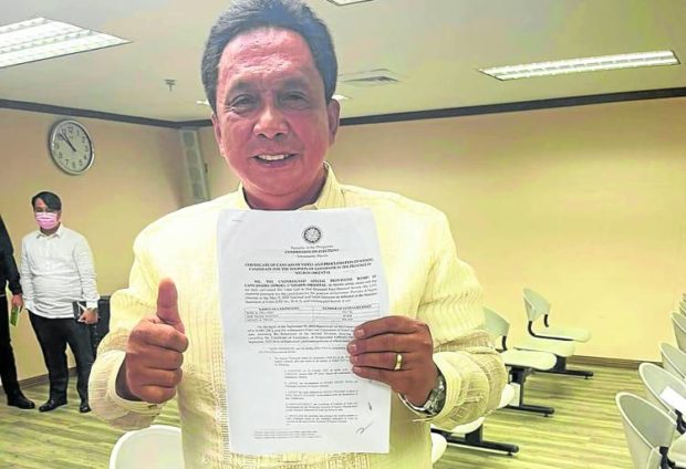 I’M BACK Former Negros Oriental Gov. Roel Degamo on Monday shows the Commission on Elections’ Certificate of Canvass of Votes and Proclamation of Winning Candidate that made his victory in the May gubernatorial race official. STORY: Comelec proclaims new governor of Negros Oriental