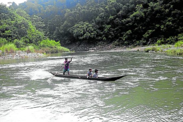 Dumagat children cross the Kaliwa River at Sitio Queborosa in Infanta, Quezon. STORY: Green group welcomes Kaliwa Dam project suspension