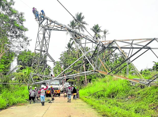 A bomb explosion on Monday toppled this power transmission tower at Barangay Bagumbayan in Kauswagan, Lanao de Norte province. STORY: Military eyes IS-linked man in Lanao tower bombing