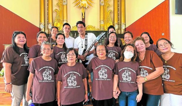 A group of singers performs the “gosu,” a set of hymns and prayers for the saints and souls. STORY: Pampanga’s ritual for the dead lives on