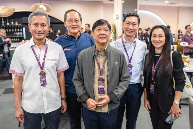 President Ferdinand "Bongbong" Marcos Jr. (center) meets with Singaporean Minister for Manpower Tan See Leng and several other officials at the Formula 1 Grand Prix in Singapore. (Photo credit: Tan See Leng’s Facebook)