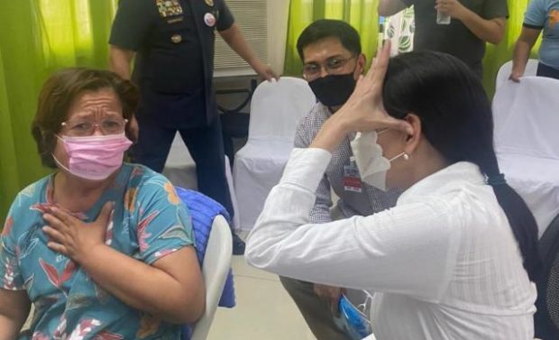 Former Sen. Leila de Lima gets a visit from Sen. Risa Hontiveros shortly after being hostaged and rescued. (Photo from the Office of Sen. Risa Hontiveros) STORY: Hostage-taker ‘determined to die and to take me with him’ – De Lima
