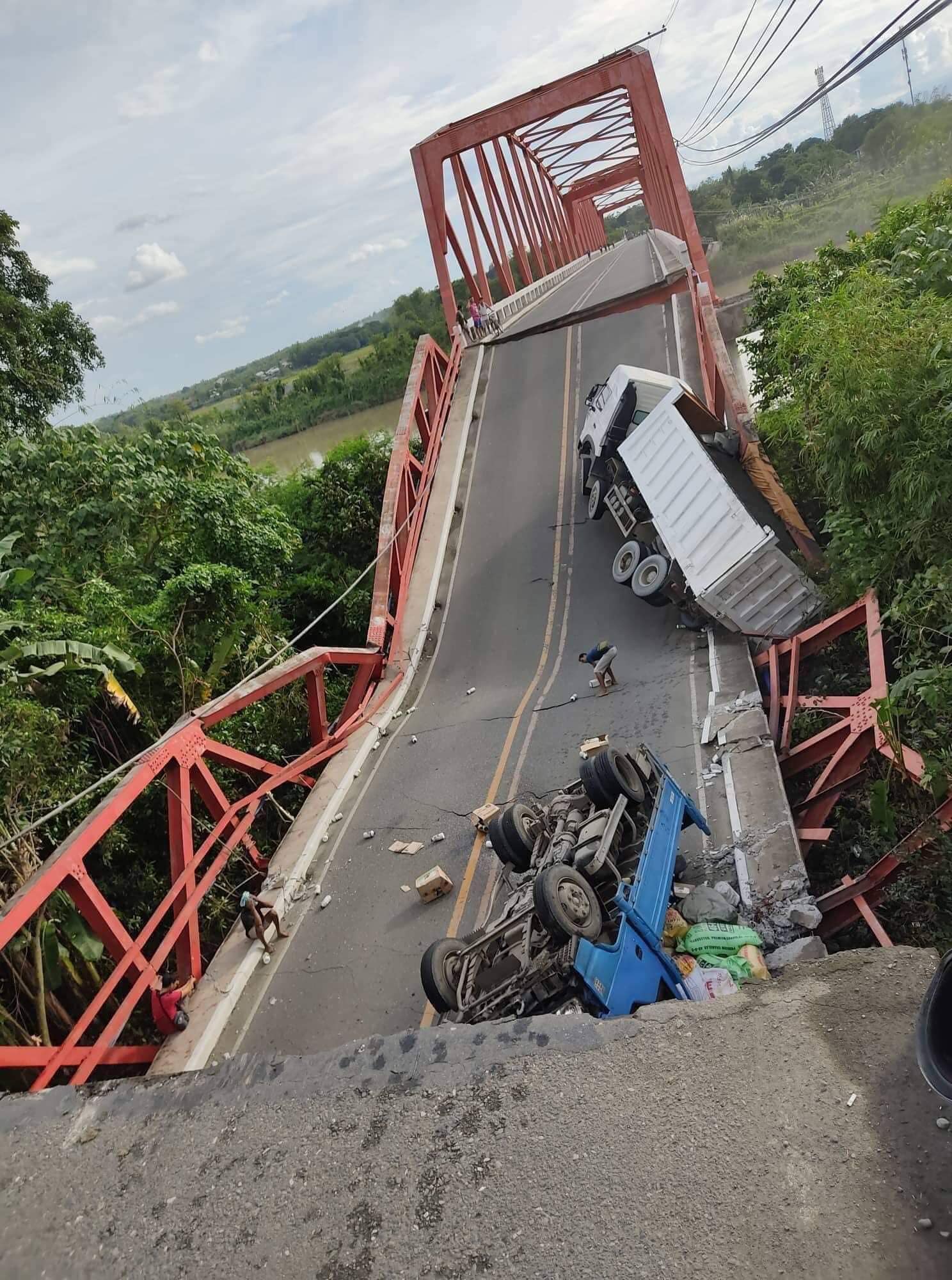 A section of the Wawa Bridge (also known as the Carlos P. Romulo Bridge) in Bayambang town, Pangasinan province, collapsed