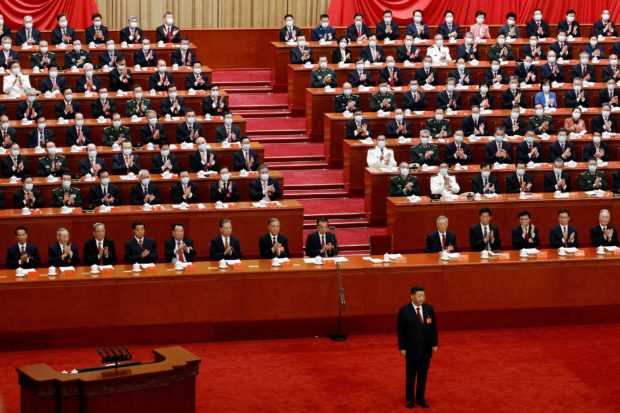 FILE PHOTO: Chinese President Xi Jinping attends the opening ceremony of the 20th National Congress of the Communist Party of China, at the Great Hall of the People in Beijing, China October 16, 2022. REUTERS/Thomas Peter/File Photo