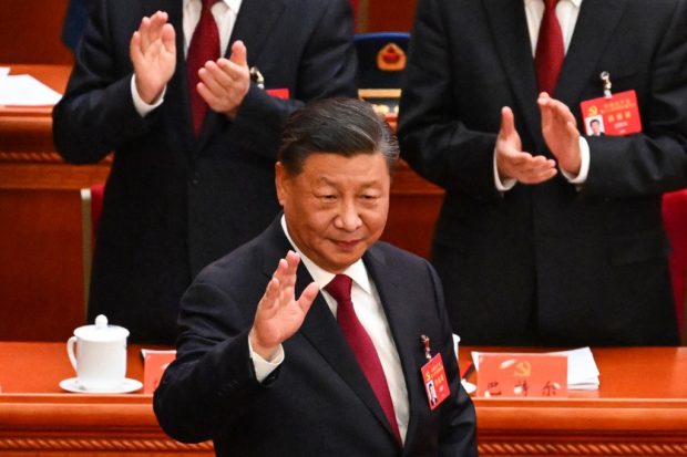 China's President Xi Jinping arrives for the opening session of the 20th Chinese Communist Party's Congress at the Great Hall of the People in Beijing on October 16, 2022. (Photo by Noel CELIS / AFP)