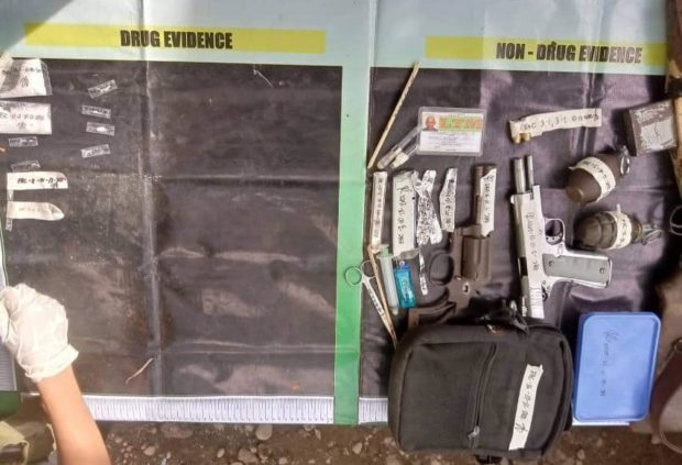 The guns, grenades and shabu seized from five suspects. 