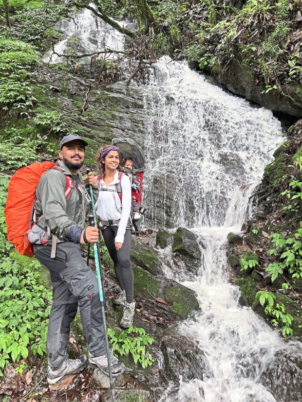 malaysian couple hiking ABC with a baby