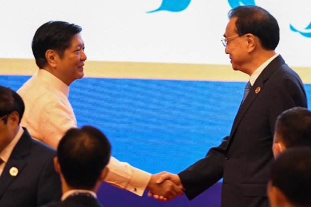 ‘FINDING RESOLUTIONS’ President Marcos meets with Chinese Premier Li Keqiang during Beijing’s summit with the Association of Southeast Asian Nations, one of the series of forums in PhnomPenh last week led by the regional bloc. —AFP