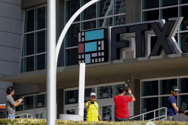 The logo of FTX is seen at the entrance of the FTX Arena in Miami, Florida, U.S., November 12, 2022. REUTERS/Marco Bello
