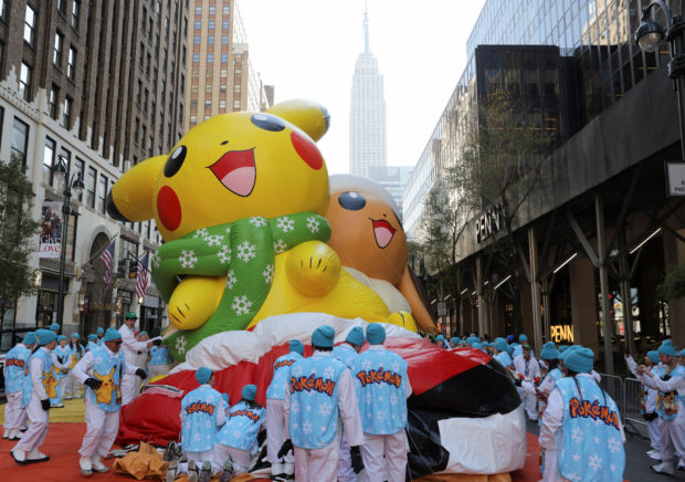 Pikachu and Eeevee balloon is deflated during the 96th Macy's Thanksgiving Day Parade in Manhattan, New York City, U.S., November 24, 2022. REUTERS/Andrew Kelly