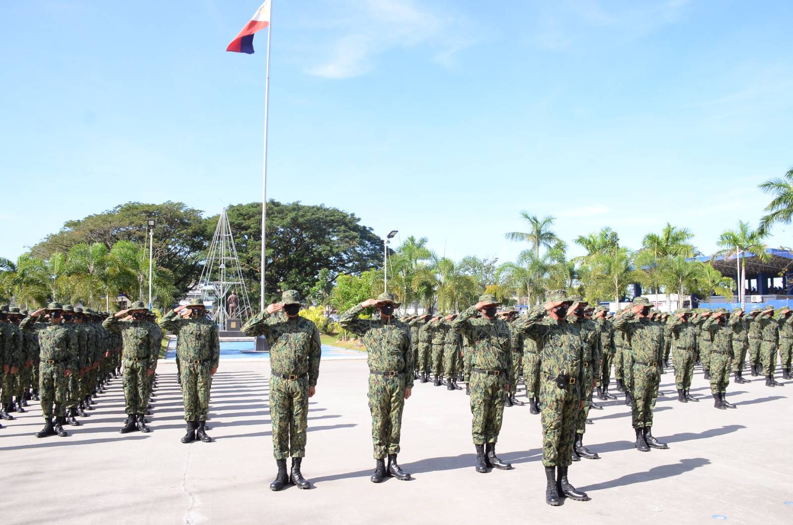 The 219 new patrolmen in formation during their oath-taking ceremony at Camp Julian Olivas