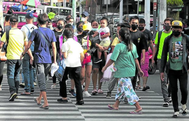 Pedestrians. STORY: More Filipinos got obese during pandemic – survey