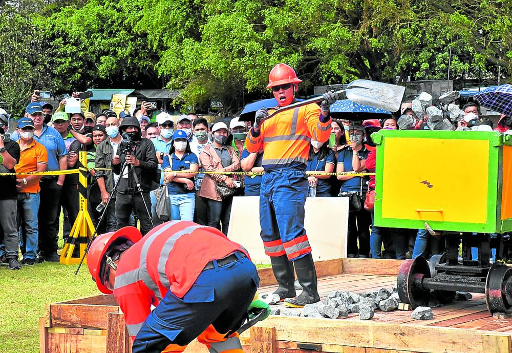 During this year’s mining conference in Baguio City, mine industry workers demonstrate the skills they need to work in the country’s mine tunnels in search of gold and other minerals. 