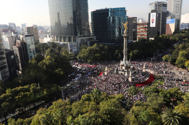 Tens of thousands march in Mexico City