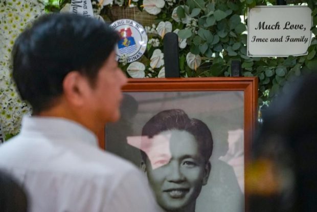 Ferdinand Marcos Jr. at his father’s grave at the Libingan ng mga Bayani