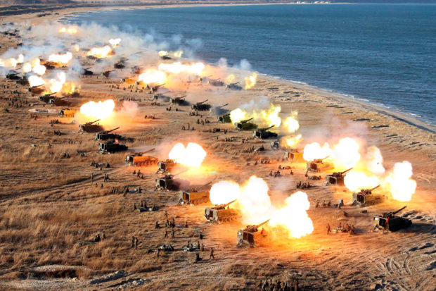 FILE PHOTO: A general view shows a drill by North Korean KPA artillery units on the front