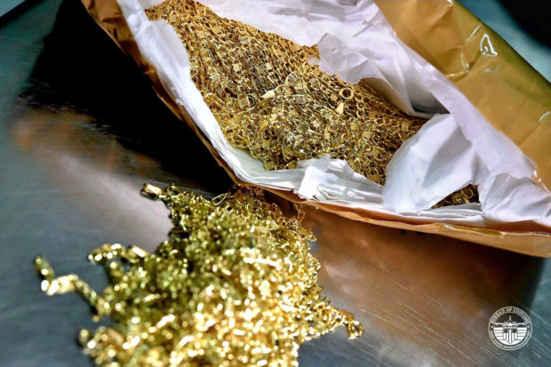 BOC accidentally finds P80 million worth of various pieces of gold jewelry in an airplane lavatory.