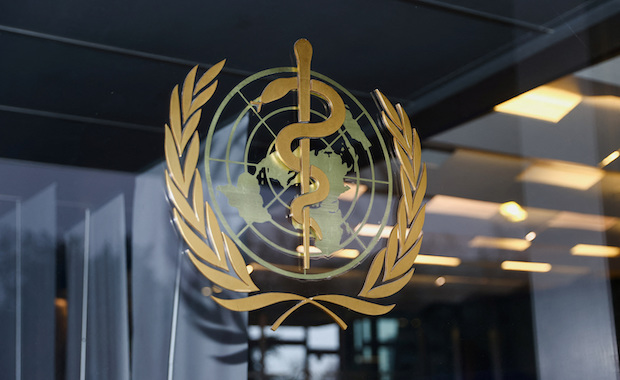 The WHO logo is pictured in Geneva. STORY: HIV testing rates fall in Europe due to COVID, eradication goal threatened
