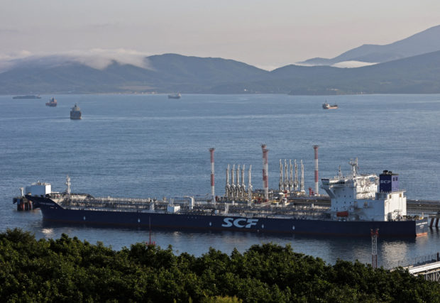 An aerial view shows the Vladimir Arsenyev tanker at the crude oil terminal Kozmino on the shore of Nakhodka Bay near the port city of Nakhodka, Russia August 12, 2022. REUTERS/Tatiana Meel/File Photo