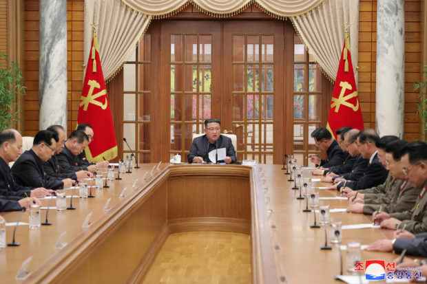 North Korean leader Kim Jong Un attends the 11th Meeting of the Political Bureau of the 8th Central Committee in this undated photo released on December 1, 2022. KCNA via REUTERS