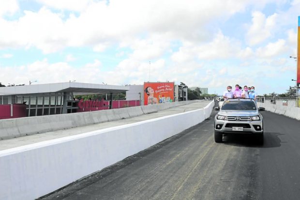 The Ungka flyover in Iloilo City, built for P680 million, holds its topping ceremony (project is nearing completion) on April 25, 2022, with former Sen. Franklin Drilon and Iloilo city and provincial officials as guests. The structure, a vital link between Iloilo City and the international airport in Cabatuan town, was closed in September after it began to sink for still unknown reasons. STORY: Explain delay in repair of Iloilo flyover, DPWH told