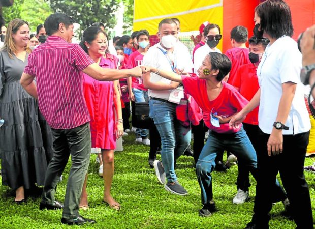 President Ferdinand “Bongbong” Marcos Jr. and first lady Liza Araneta-Marcos welcome children to Malacañang on Sunday for the government’s gift-giving program. STORY: Marcos waxes nostalgic during gift-giving event