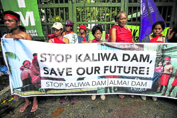 In this photo taken in 2019, environmental activists and members of indigenous peoples groups picket in front of the Department of Environment and Natural Resources offices in Quezon City to ask for a dialogue with agency officials as they call for the rejection of Kaliwa Dam’s environmental compliance certificate. STORY: ‘False consent,’ priest says of Kaliwa Dam OK