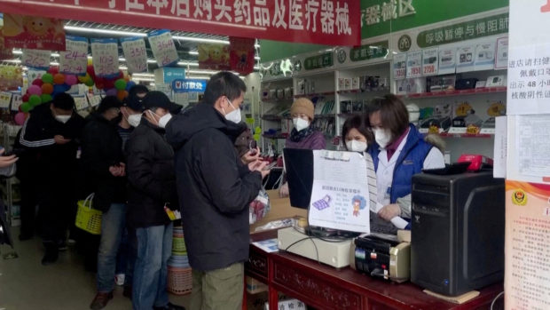 China's COVID-19 scare sparks run on flu medicines