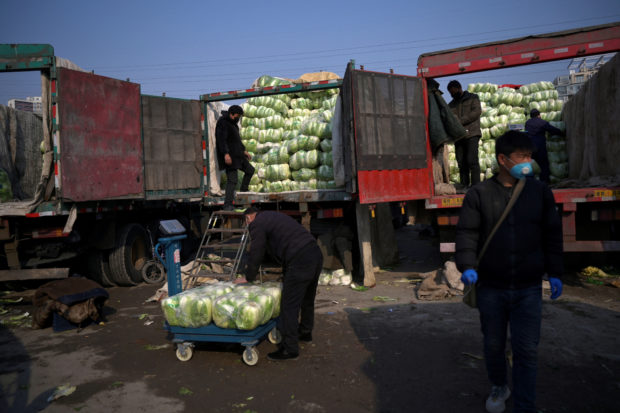 Chinese farmers let cabbages rot 