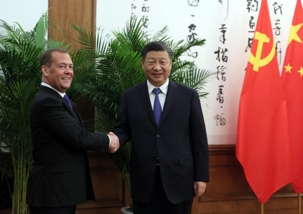 Dmitry Medvedev and Xi Jinping