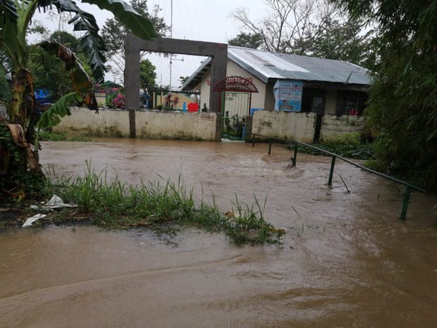 A village in Minalabac town, Camarines Sur province is submerged in floodwater due to incessant rains on Monday, Dec. 19. (Photo courtesy of MDRRMO Minalabac)
