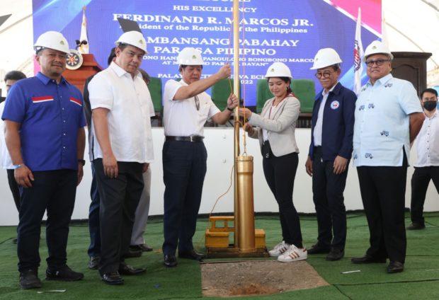 President Ferdinand Marcos Jr. leads the groundbreaking for the 11-hectare housing project under the Pambansang Pabahay Para sa Pilipino program together with Senator Joseph Victor "JV" Ejercito (left), Speaker Martin Romualdez (second from left), Palayan City Mayor Viandrei Nicole "Vianne" J. Cuevas (third from right), Department of Human Settlements and Urban Development (DHSUD) Secretary Jose Rizalino Acuzar (second from right), and Government Service and Insurance System (GSIS) President and General Manager Jose Arnulfo "Wick" Veloso (right) in Brgy. Atate in Palayan City, Nueva Ecija, on Wednesday, December 21, 2022. Photo from the Office of the House Speaker