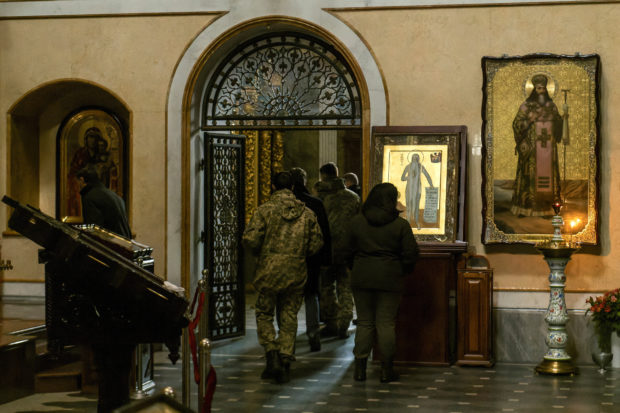FILE PHOTO: Ukrainian law enforcement officers inspect one of churches of the Kyiv Pechersk Lavra monastery in Kyiv