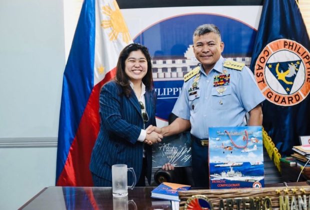 Department of Information and Communications Technology (DICT) Undersecretary Anna Mae Yu Lamentillo received the challenge coin from Philippine Coast Guard (PCG) Admiral Artemio Abu.