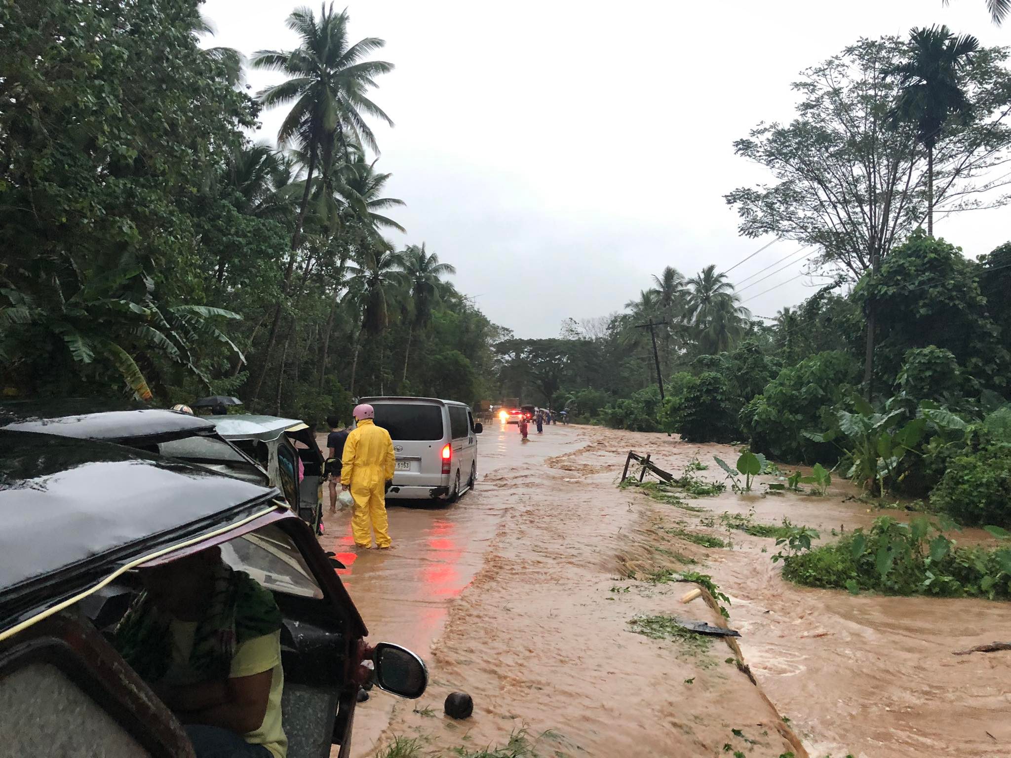 A section of the national highway in Barangay Barong-barong, Brooke's Point town, Palawan province is submerged in floodwater palawan rains flooding 