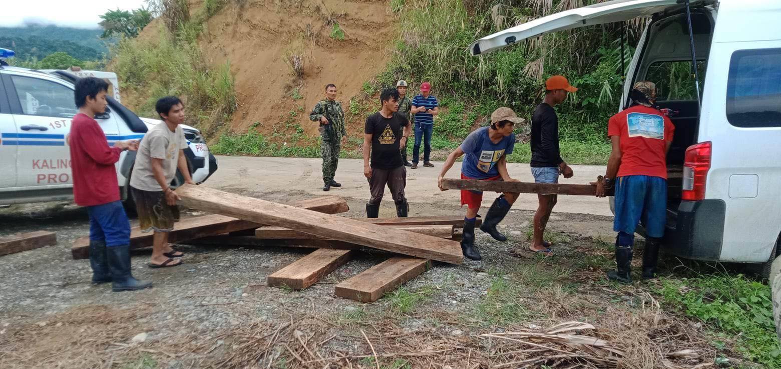 Police seized these illegally cut narra flitches worth P259,000 and arrested seven men who were hauling the wood on a river bank in Tanudan town, Kalinga province 